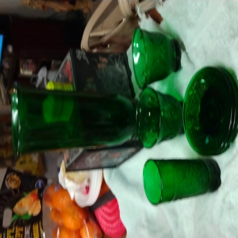 glassware  dark green  3saucers one small glass vase two pudding bowls